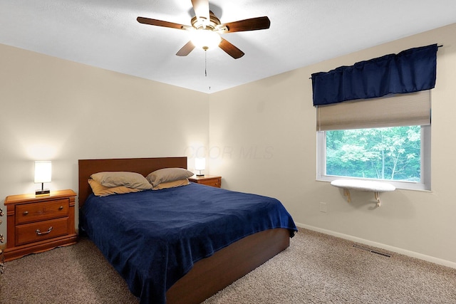 572 Sycamore Dr, Pickerington, OH 43147 - bedroom with carpet flooring, baseboards, and a ceiling fan