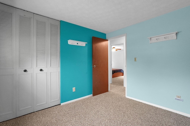 572 Sycamore Dr, Pickerington, OH 43147 - unfurnished bedroom featuring carpet flooring, a closet, and baseboards