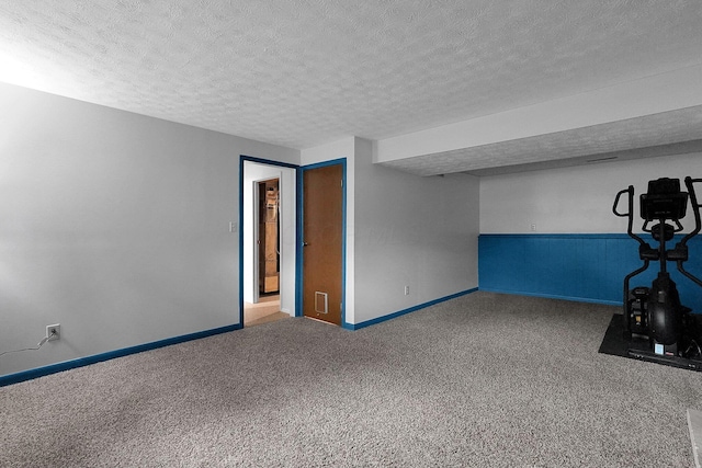 572 Sycamore Dr, Pickerington, OH 43147 - workout area with carpet flooring, a textured ceiling, and baseboards