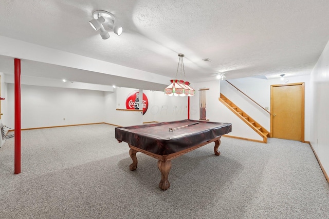 recreation room featuring carpet flooring, a textured ceiling, and billiards