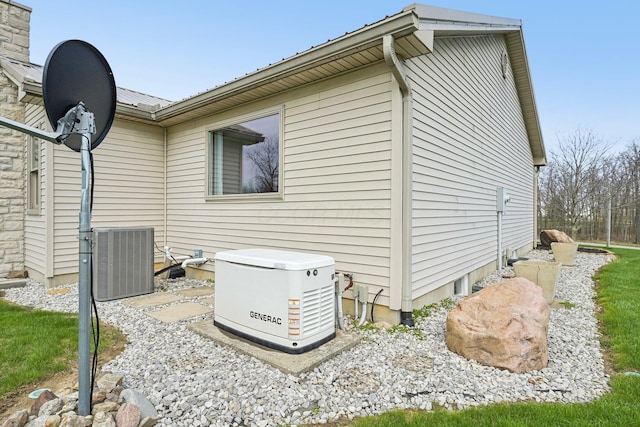 view of property exterior with central AC unit