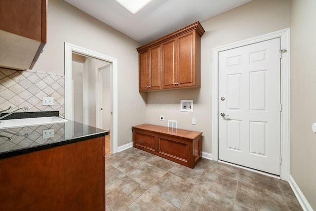 4568 Hickory Rock Dr, Powell, OH 43065 - clothes washing area featuring a sink, hookup for an electric dryer, cabinet space, baseboards, and washer hookup