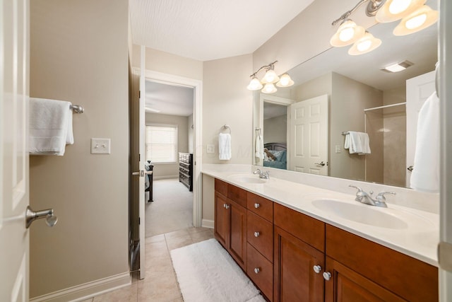 4568 Hickory Rock Dr, Powell, OH 43065 - ensuite bathroom with connected bathroom, a sink, tile patterned floors, and visible vents