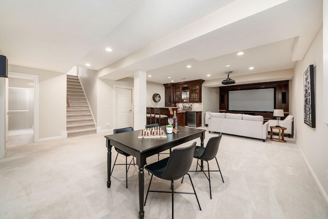 4568 Hickory Rock Dr, Powell, OH 43065 - dining area with recessed lighting, stairs, baseboards, and light carpet