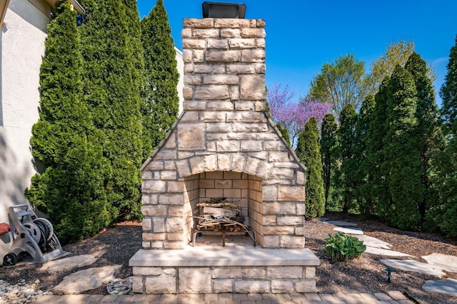 4568 Hickory Rock Dr, Powell, OH 43065 - details featuring an outdoor stone fireplace