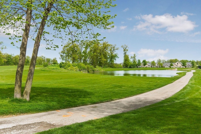 4568 Hickory Rock Dr, Powell, OH 43065 - view of community featuring a yard, a water view, and golf course view