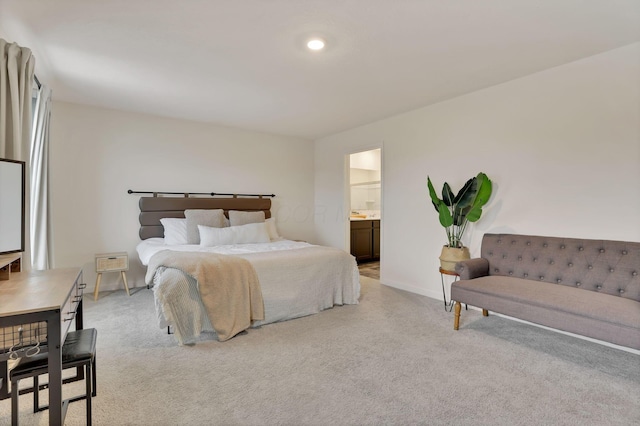 3051 Lamptonridge Dr, Columbus, OH 43232 - bedroom with baseboards, ensuite bath, and light colored carpet