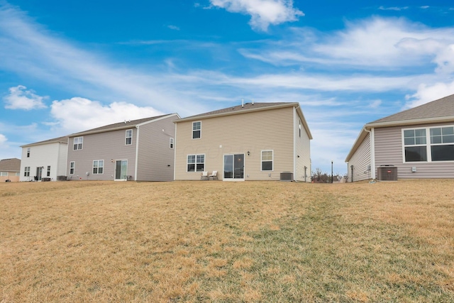 3051 Lamptonridge Dr, Columbus, OH 43232 - back of house featuring a lawn and central AC