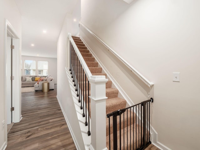 9239 Horseshoe St, Plain City, OH 43064 - stairway featuring baseboards, wood finished floors, and recessed lighting