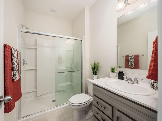 9239 Horseshoe St, Plain City, OH 43064 - full bath featuring toilet, vanity, tile patterned flooring, and a shower stall