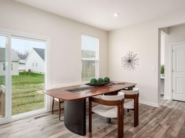 9239 Horseshoe St, Plain City, OH 43064 - dining space featuring baseboards, visible vents, light wood-style floors, and recessed lighting