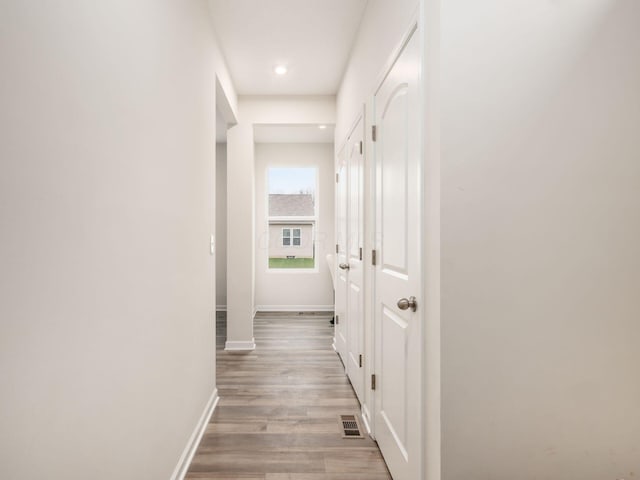 9239 Horseshoe St, Plain City, OH 43064 - corridor featuring baseboards, visible vents, and light wood-style floors