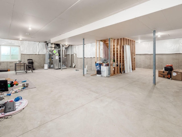 9239 Horseshoe St, Plain City, OH 43064 - basement with heating unit and electric water heater