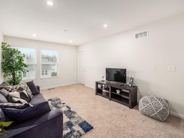 9239 Horseshoe St, Plain City, OH 43064 - living room featuring carpet flooring, recessed lighting, baseboards, and visible vents