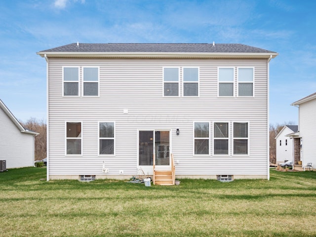 9239 Horseshoe St, Plain City, OH 43064 - back of property featuring cooling unit, entry steps, and a lawn