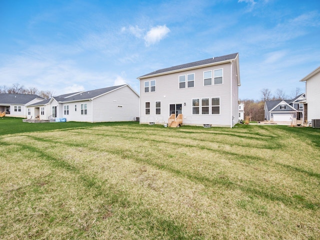 9239 Horseshoe St, Plain City, OH 43064 - rear view of property featuring a lawn, cooling unit, and a residential view