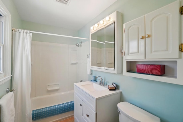 1800 Timberline Dr, Springfield, OH 45504 - full bathroom with vanity, visible vents, toilet, and shower / tub combo