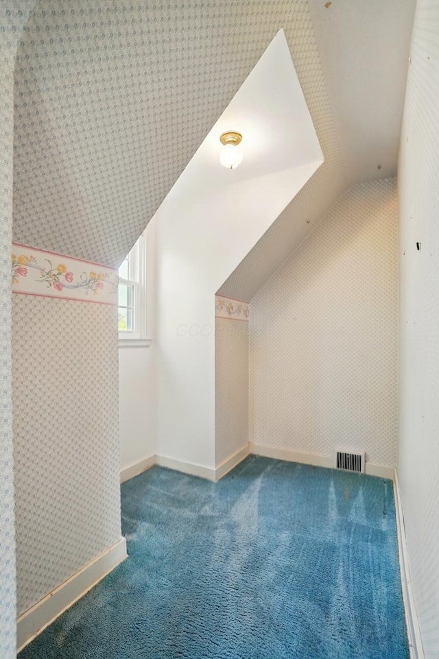 1800 Timberline Dr, Springfield, OH 45504 - bonus room featuring carpet flooring, baseboards, vaulted ceiling, and visible vents
