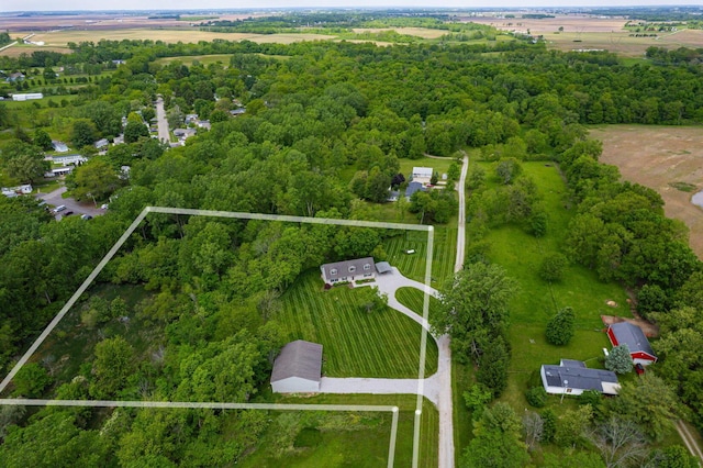 3040 Lafayette Plain City Rd, London, OH 43140 - aerial view of property and surrounding area with property parcel outlined and a forest