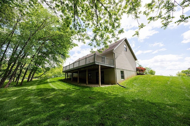 3040 Lafayette Plain City Rd, London, OH 43140 - rear view of house featuring a wooden deck and a yard