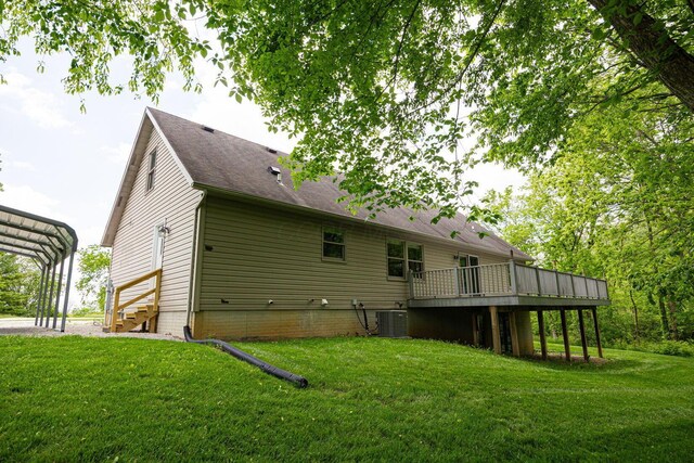 3040 Lafayette Plain City Rd, London, OH 43140 - back of house with central AC unit, a deck, a yard, and a shingled roof