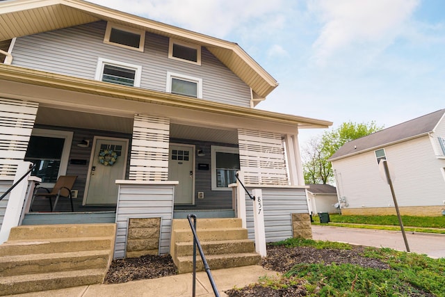 view of front of property featuring covered porch