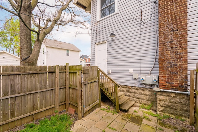 view of patio featuring fence