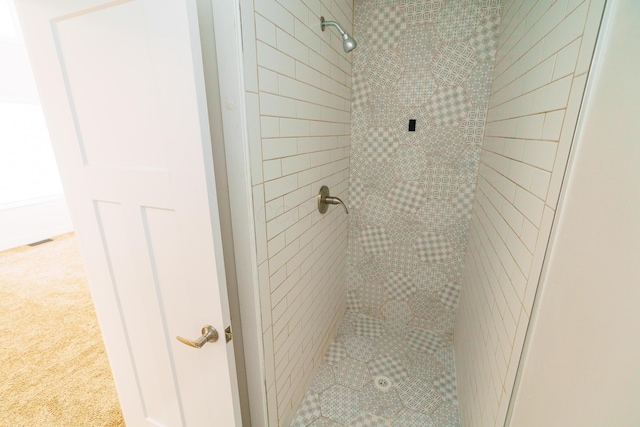 full bath featuring a shower stall