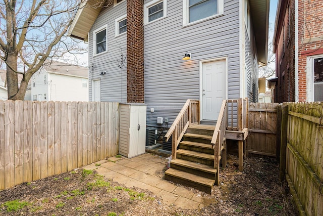 property entrance featuring fence
