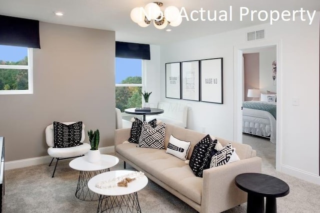 6326 Anguria Dr Lot 244, Hilliard, OH 43026 - carpeted living area featuring a chandelier, plenty of natural light, and recessed lighting