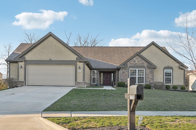 view of front facade with driveway, a front yard, stone siding, stucco siding, and an attached garage