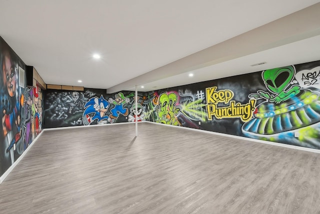 playroom featuring baseboards, wood finished floors, and recessed lighting