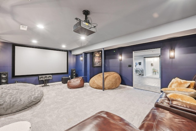 carpeted home theater with recessed lighting