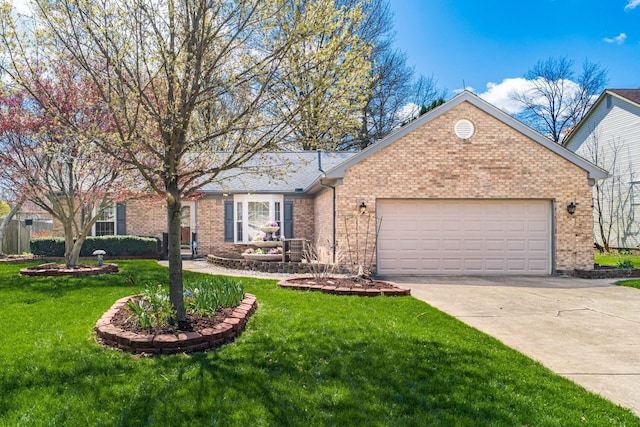 view of front of home with an attached garage, a front lawn, driveway, and brick siding