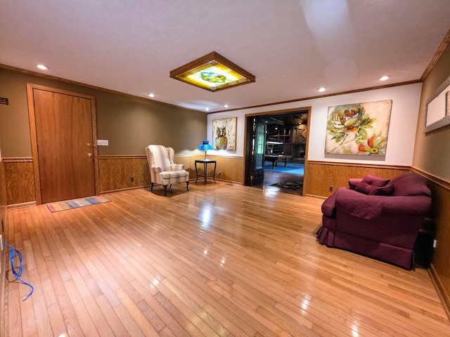 5344 Ridge Ave SE, Canton, OH 44707 - sitting room with a wainscoted wall, ornamental molding, wood-type flooring, recessed lighting, and wood walls