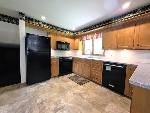 5344 Ridge Ave SE, Canton, OH 44707 - kitchen featuring black appliances, backsplash, brown cabinetry, and a sink