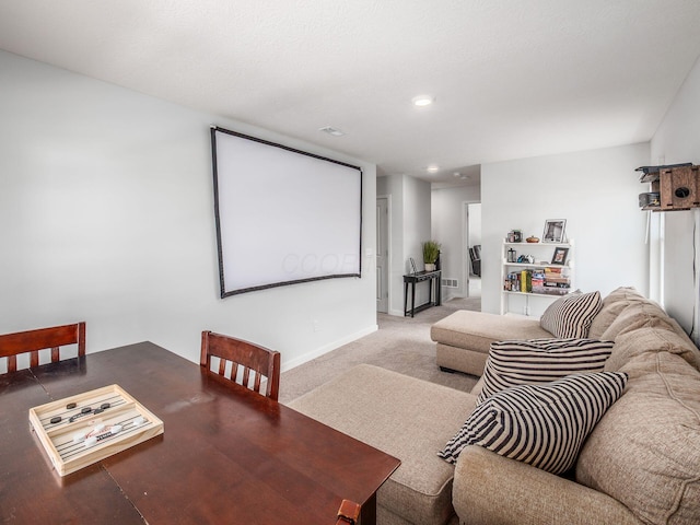 dining room featuring baseboards, carpet flooring, and recessed lighting