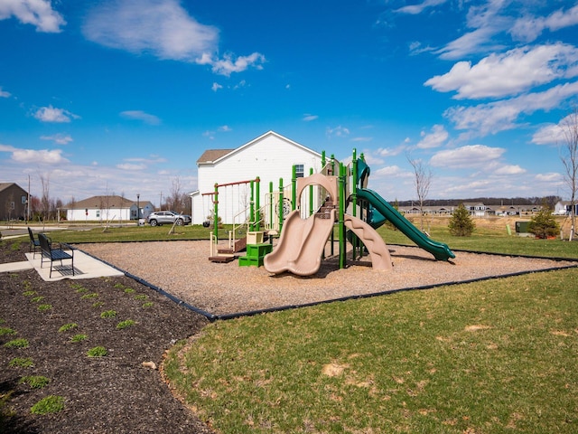 community play area with a lawn