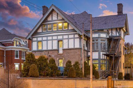 1349 E Broad St, Columbus, OH 43205 - back of house with a chimney and roof with shingles