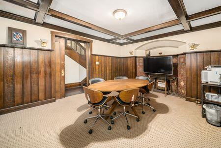 1349 E Broad St, Columbus, OH 43205 - dining area with beam ceiling, coffered ceiling, wooden walls, and wainscoting