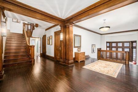 1349 E Broad St, Columbus, OH 43205 - interior space with baseboards, stairs, ornamental molding, and wood finished floors