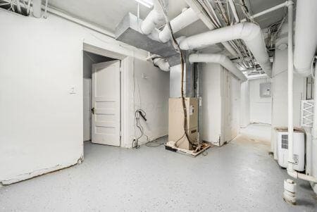 1349 E Broad St, Columbus, OH 43205 - unfinished basement featuring heating unit