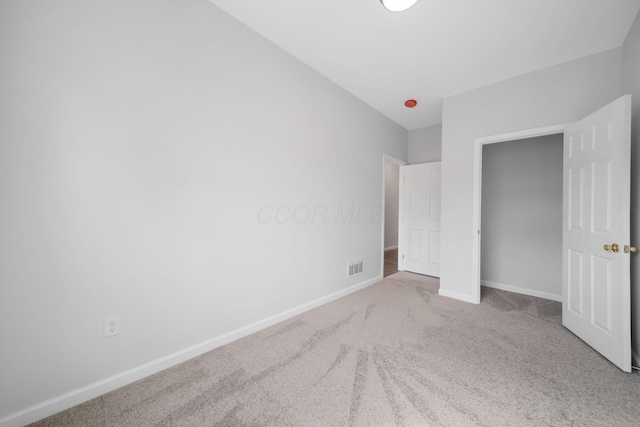 1559 Obetz Ave, Obetz, OH 43207 - unfurnished bedroom featuring baseboards, carpet flooring, and visible vents