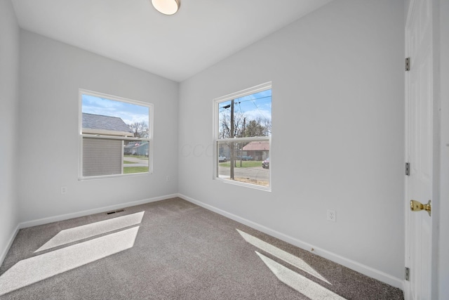 1559 Obetz Ave, Obetz, OH 43207 - carpeted empty room with baseboards and visible vents