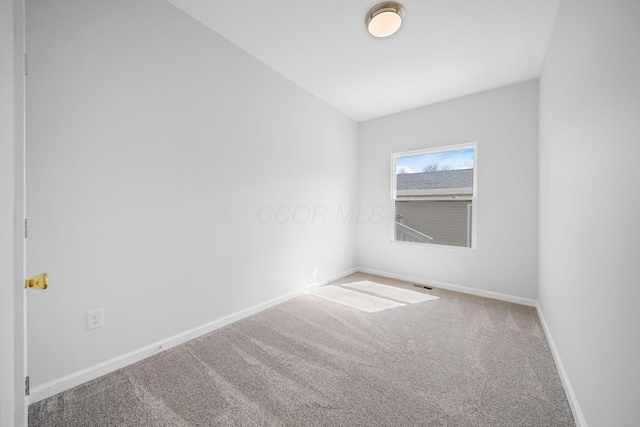 1559 Obetz Ave, Obetz, OH 43207 - unfurnished room with baseboards, visible vents, and carpet flooring