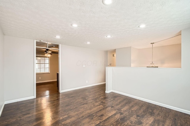 3484 Sweetday St, Columbus, OH 43224 - spare room featuring a textured ceiling, recessed lighting, baseboards, wood finished floors, and ceiling fan