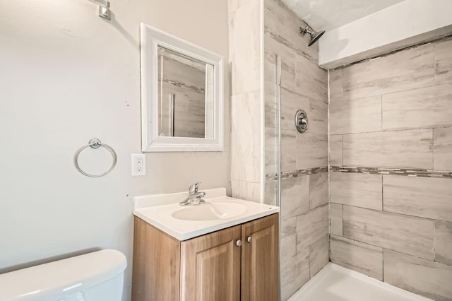 3484 Sweetday St, Columbus, OH 43224 - bathroom with vanity, tiled shower, and toilet