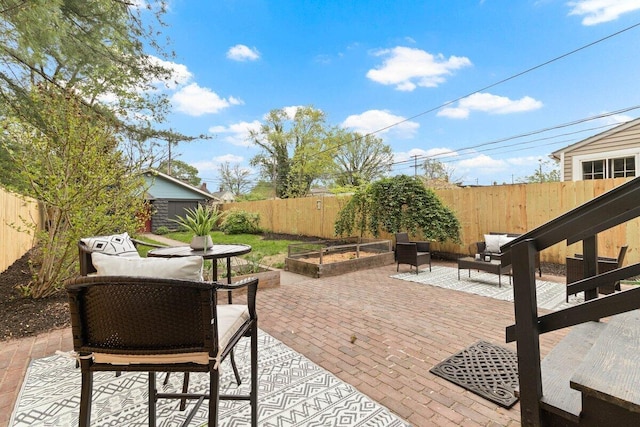 view of patio / terrace with a fenced backyard and outdoor lounge area