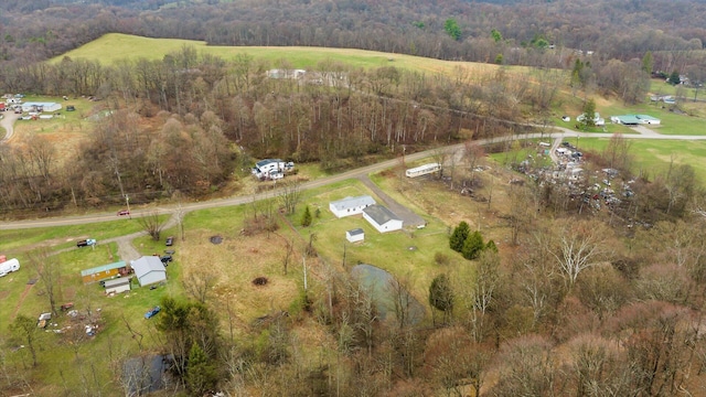aerial view featuring a rural view and a forest view
