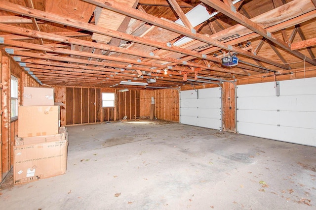 garage featuring a garage door opener